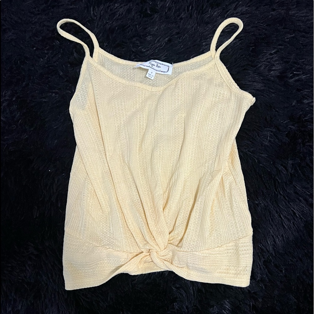 Yellow tank top, crosses in front, never worn.